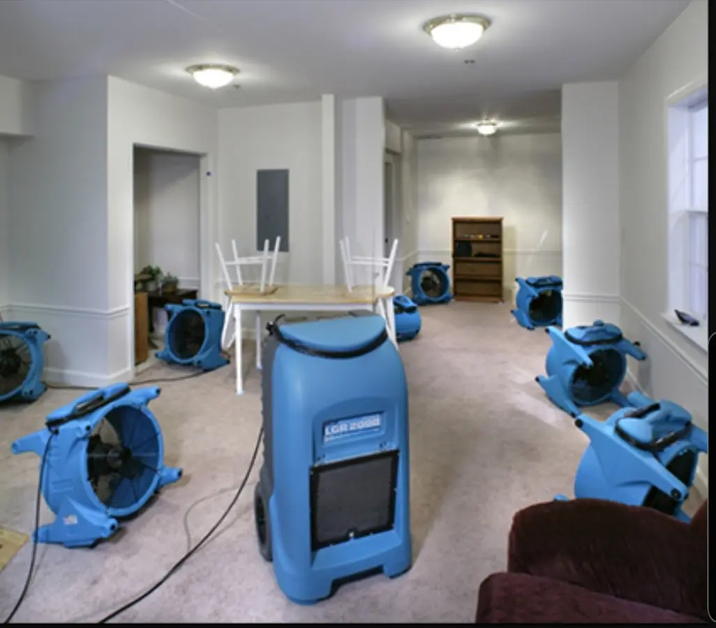 Air movers and dehumidifier setup for Water Extraction & Removal in Edgerton
